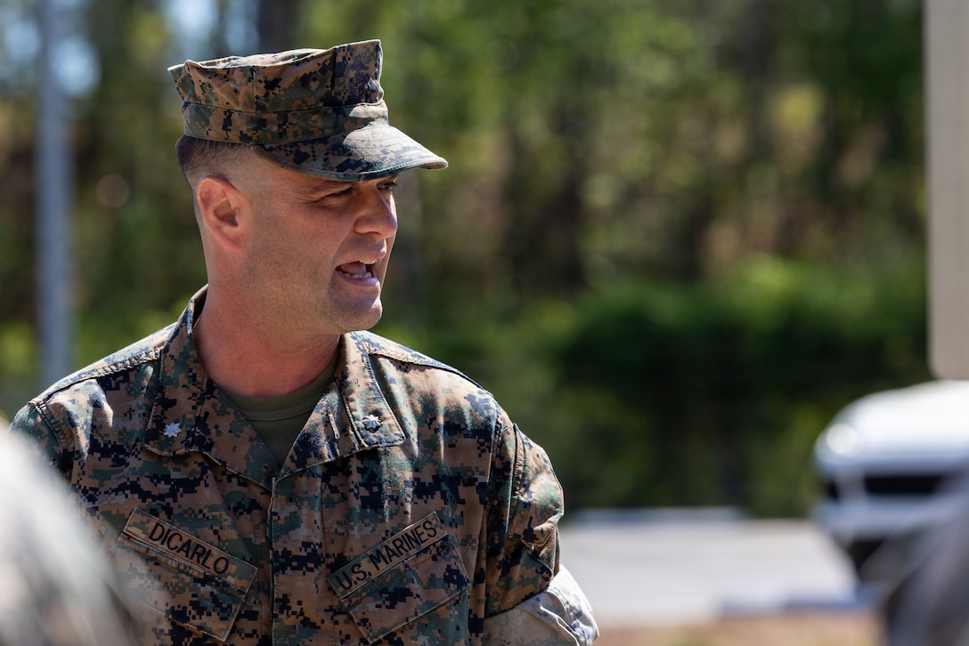 U.S. Marine Corps Lt. Col. Richard DiCarlo, executive officer of Deployment Processing Command Support Reserve-Support Unit East, speaks to a crowd during a meritorious promotion ceremony in Jacksonville, North Carolina, April 2, 2026. Philips was selected for meritorious promotion spanning across Marine Forces Reserve. (U.S. Marine Corps photo by Sgt. Alexander Lesko)