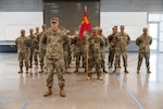 Members of the 3665th Explosive Ordnance Disposal Company, or EOD, stand in a formation during their demobilization ceremony at the Speedway Armory in Las Vegas, Nevada, April 7, 2026.