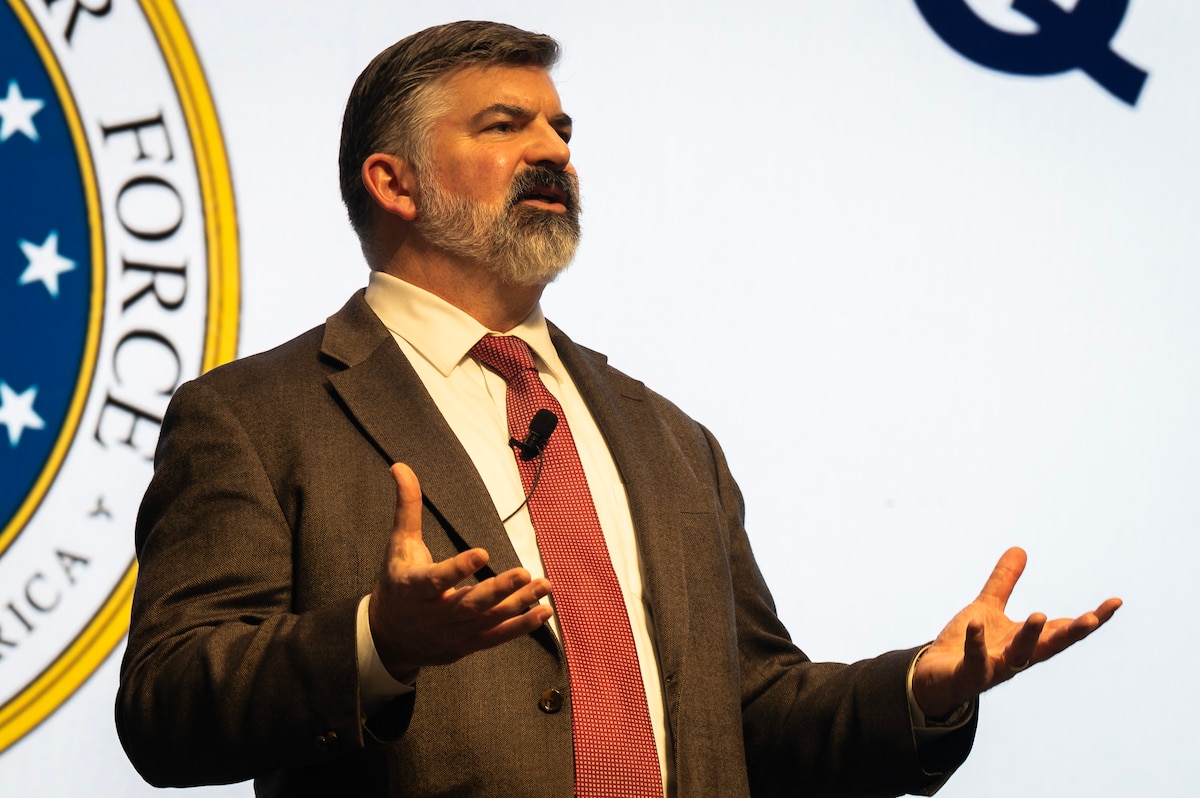 Person talking on a stage