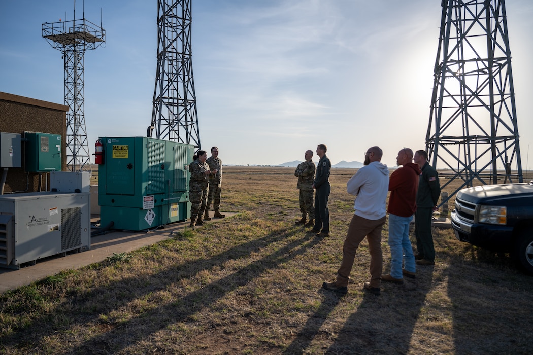 The 97th Air Mobility Wing command team and 97th Operations Support Squadron leadership visit the Ground Air Transmit Receive site at Altus Air Force Base, Oklahoma, March 30, 2026. The site provided secure communications and satellite connectivity to support stateside training, coordination and mission operations. (U.S. Air Force photo by Airman 1st Class Nathan Langston)