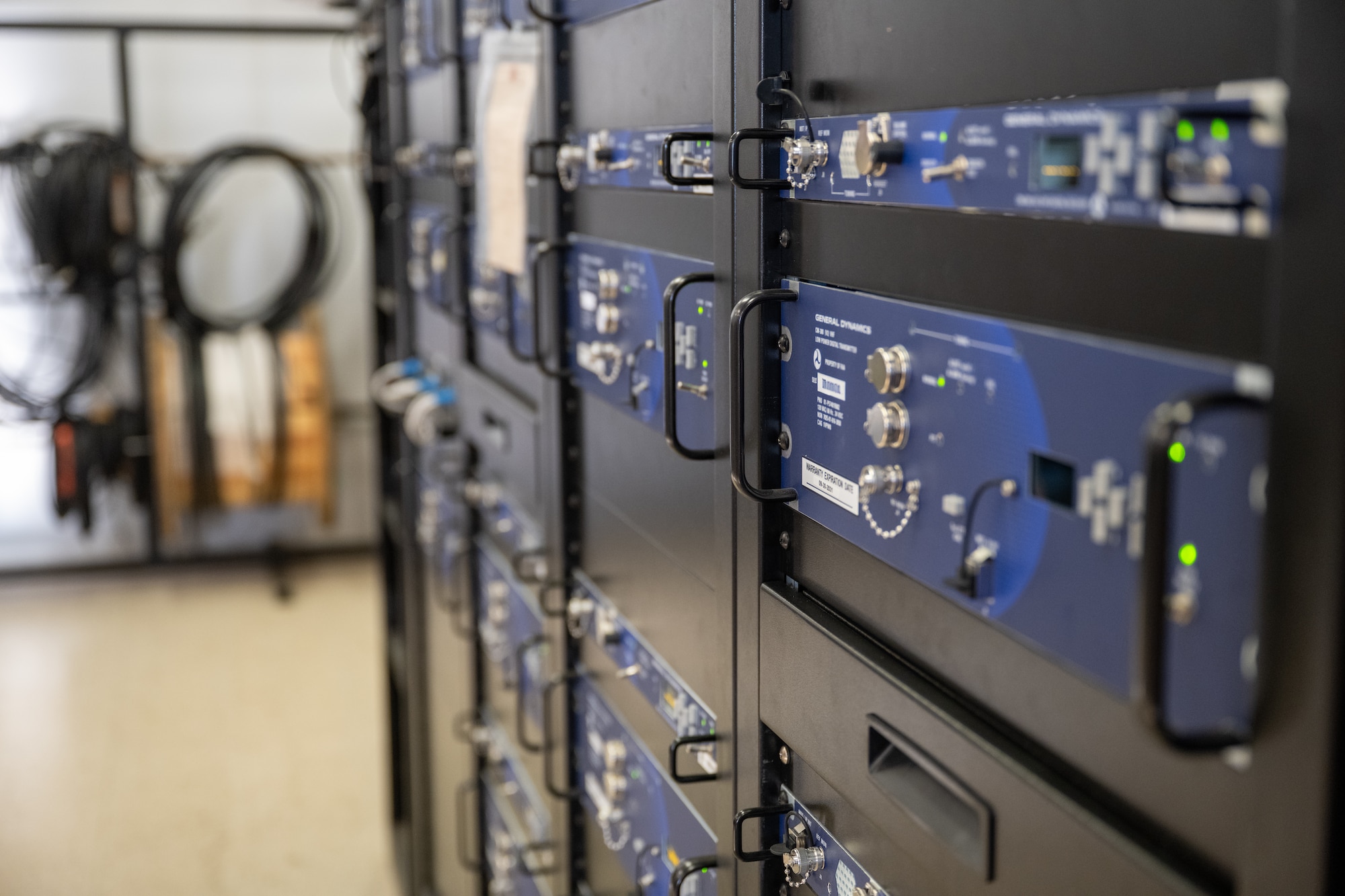 Communications equipment racks inside the Ground Air Transmit Receive site control center are shown at Altus Air Force Base, Oklahoma, March 30, 2026. The system provided secure communications and satellite connectivity to support stateside training, coordination and mission operations. (This photo has been modified for security reasons.) (U.S. Air Force photo by Airman 1st Class Nathan Langston)