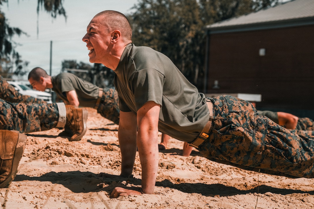 A recruit with Charlie Company, 1st Recruit Training Battalion, Recruit Training Regiment, conduct incentive training exercises on Marine Corps Recruit Depot Parris Island, S.C., March 18, 2026. Drill instructors administer incentive training to recruits in order to correct deficiencies and increase discipline. (U.S. Marine Corps photo by Cpl. Jordy Morales)