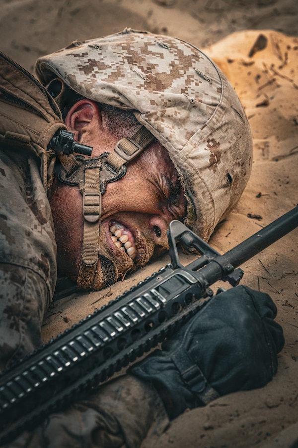Rct. Charles Flunder, a recruit with Fox Company, 2nd Recruit Training Battalion, Recruit Training Battalion, execute the day movement course on Marine Corps Recruit Depot Parris Island, S.C., April 1, 2026. The movement course is conducted during Basic Warrior Training and teaches recruits essential skills for navigating obstacles in a combat environment. (U.S. Marine Corps photo by Cpl. Jordy Morales)