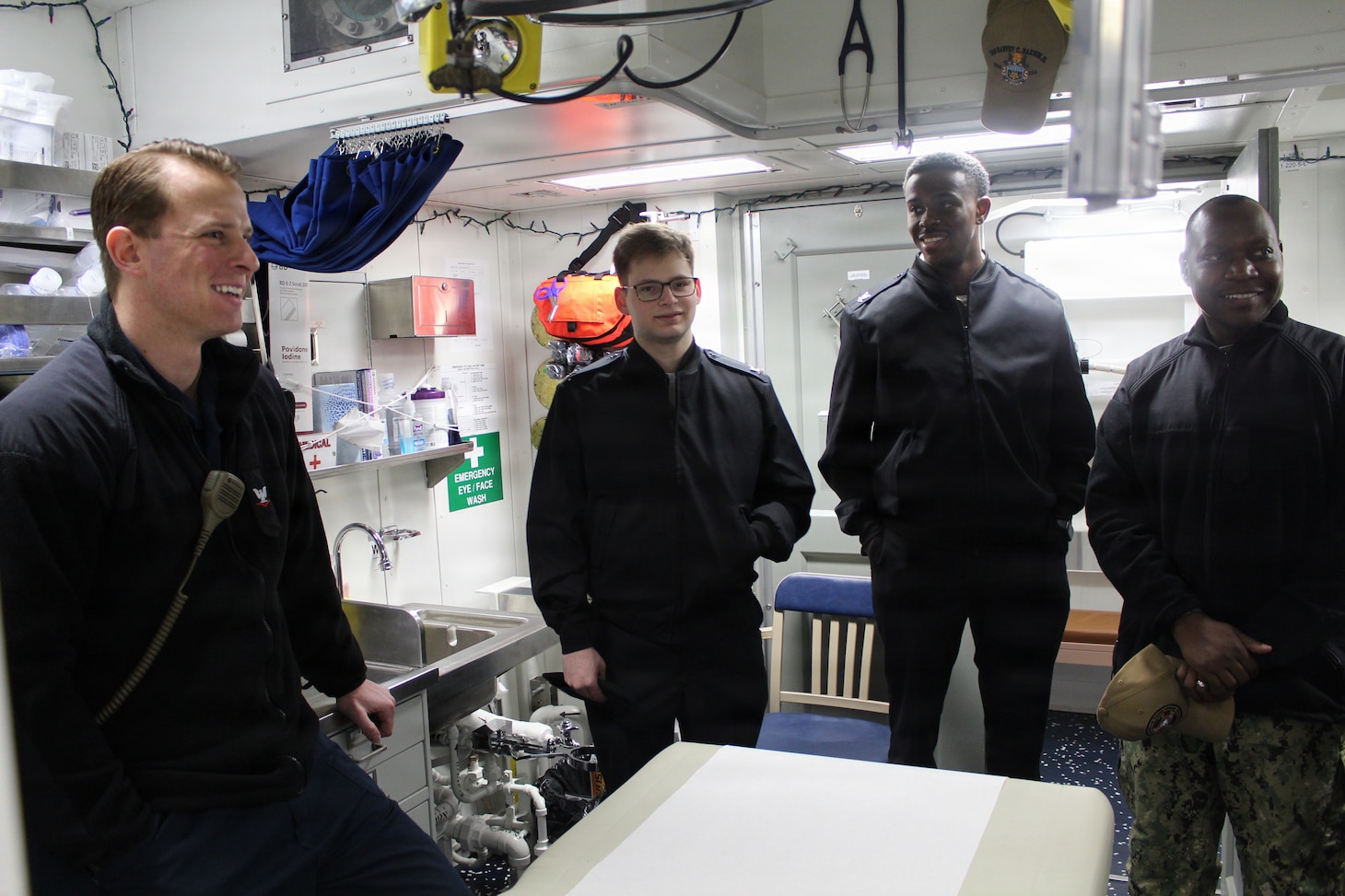 260306-N-OV429-2001 NEWPORT, R.I. (March 6, 2026) – Sailors from Navy Medicine Readiness and Training Command (NMRTC) New England, tour the sick bay onboard the future Arleigh Burke-class guided missile destroyer USS Harvey C. Barnum Jr. (DDG 124), March 6, 2026. The tour highlighted the vital role Navy Medicine plays in sustaining warfighter readiness at sea, reinforcing how medical Sailors contribute directly to mission success. NMRTC New England provides operational training to healthcare professionals through healthcare delivery to optimize both medical staff and Warfighter and readiness. (U.S. Navy photo by Hospital Corpsman Third Class Jammel Tilley)