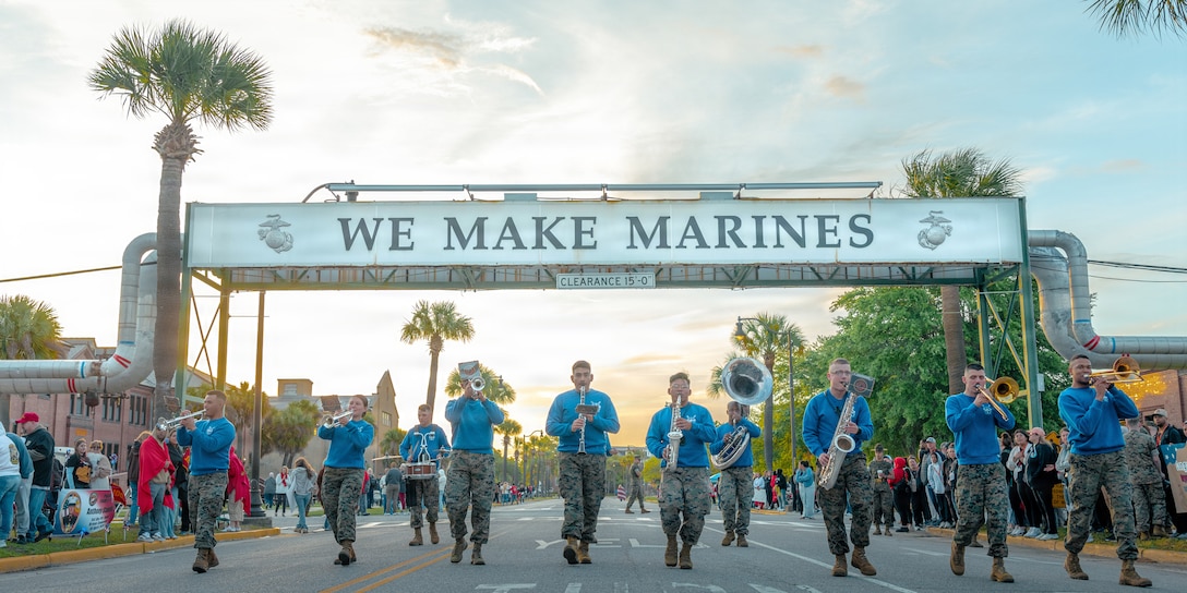 The Parris Island Marine Corps Band performs during the motivational run for Bravo Company, 1st Recruit Training Battalion, on Marine Corps Recruit Depot Parris Island, S.C., April 9, 2026. The motivational run takes place on Family Day, the day before graduation, and serves as a first time for visiting families to see their new Marines. (U.S. Marine Corps photo by Lance Cpl. Ayden Cassano)