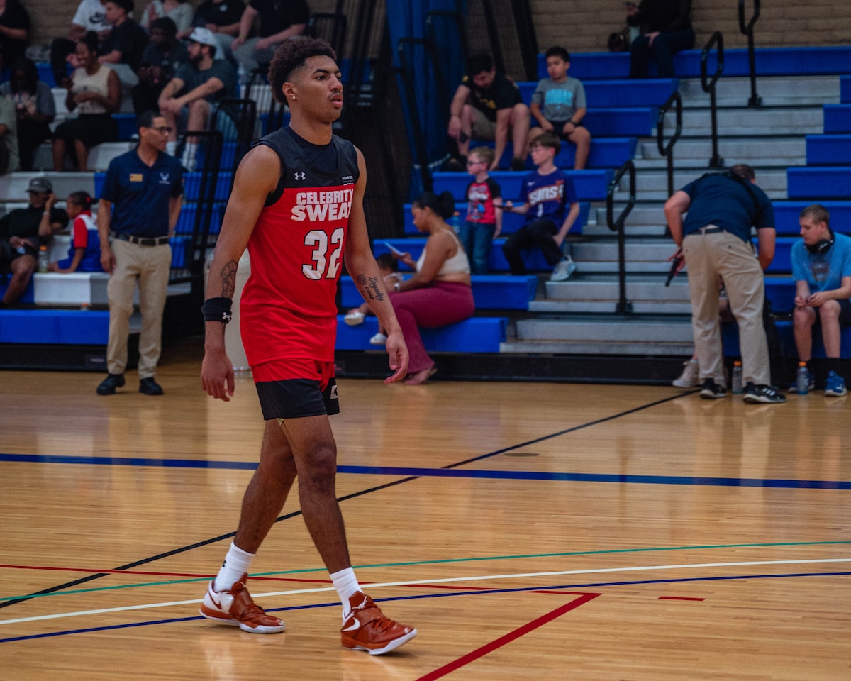 U.S. Air Force Senior Airman Eric Smith, 56th Equipment Management Squadron data analyst, walks on a court during Celebrity Slam Jam, April 2, 2026, at Luke Air Force Base, Arizona.