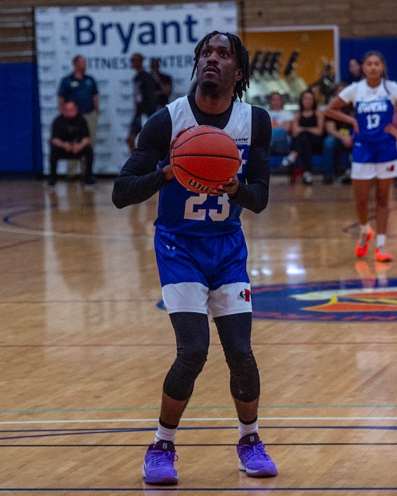 D’aydrian Harding, content creator, shoots a free throw, April 2, 2026, at Luke Air Force Base, Arizona.