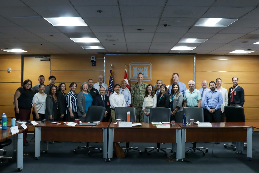U.S. Army Corps of Engineers Los Angeles District employees and county officials pose for a group photo during the April 7 Seven Counties Flood Directors meeting at the LA District headquarters building in downtown Los Angeles.