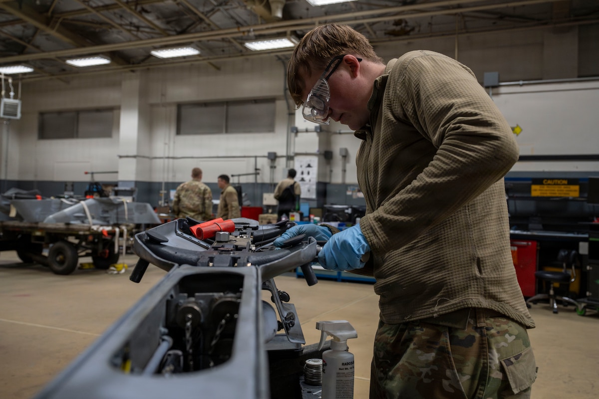 U.S. Air Force Airman Xander Bradley, 35th Munitions Squadron armament floor technician, works on an F-16 Fighting Falcon wing weapons pylon at Misawa Air Base, Japan, March 31, 2026.