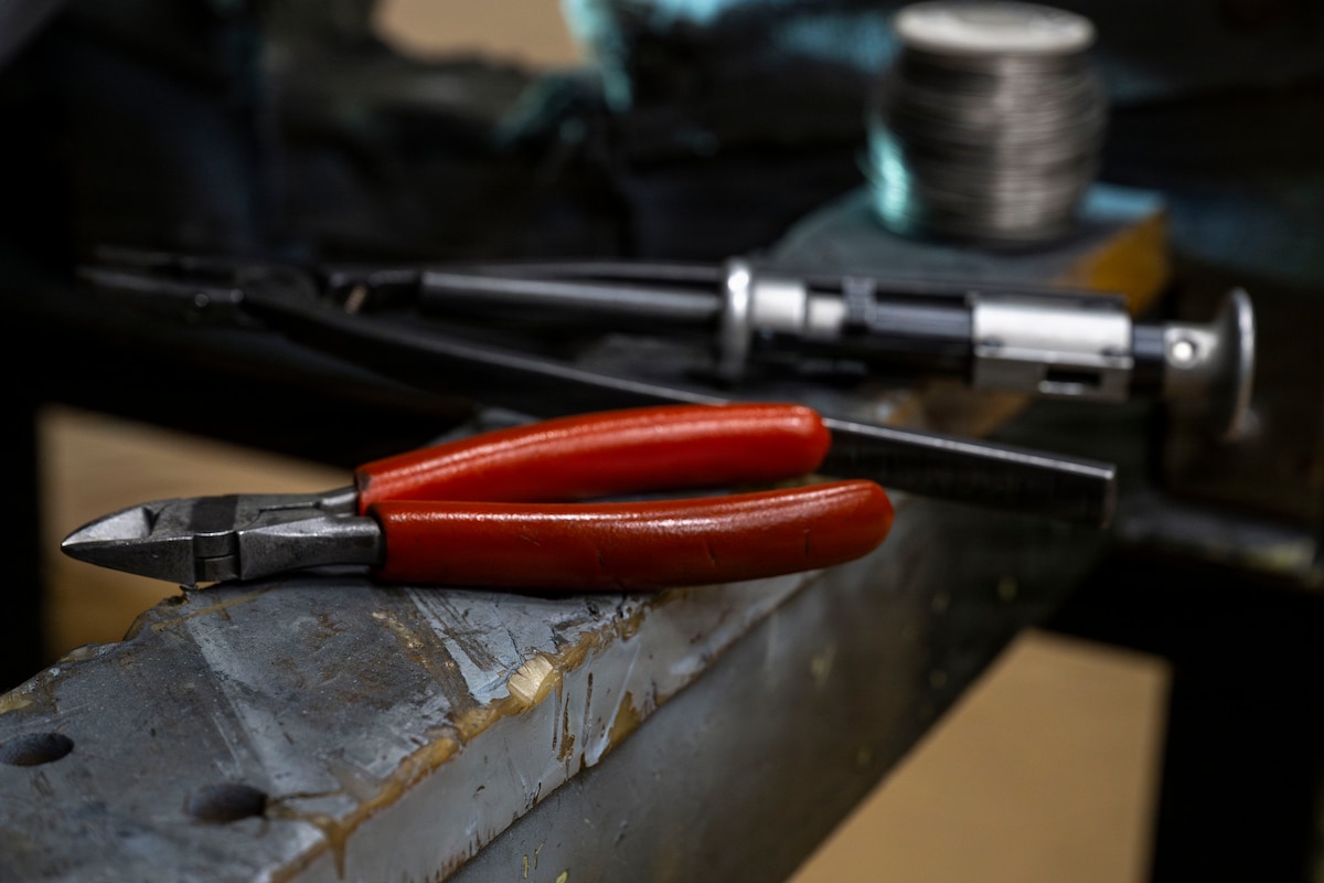 Tools lay next to aircraft components at the 35th Munitions Squadron armament flight building at Misawa Air Base, Japan, March 31, 2026