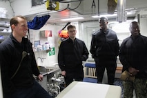 260306-N-OV429-2001 NEWPORT, R.I. (March 6, 2026) – Sailors from Navy Medicine Readiness and Training Command (NMRTC) New England, tour the sick bay onboard the future Arleigh Burke-class guided missile destroyer USS Harvey C. Barnum Jr. (DDG 124), March 6, 2026. The tour highlighted the vital role Navy Medicine plays in sustaining warfighter readiness at sea, reinforcing how medical Sailors contribute directly to mission success. NMRTC New England provides operational training to healthcare professionals through healthcare delivery to optimize both medical staff and Warfighter and readiness. (U.S. Navy photo by Hospital Corpsman Third Class Jammel Tilley)