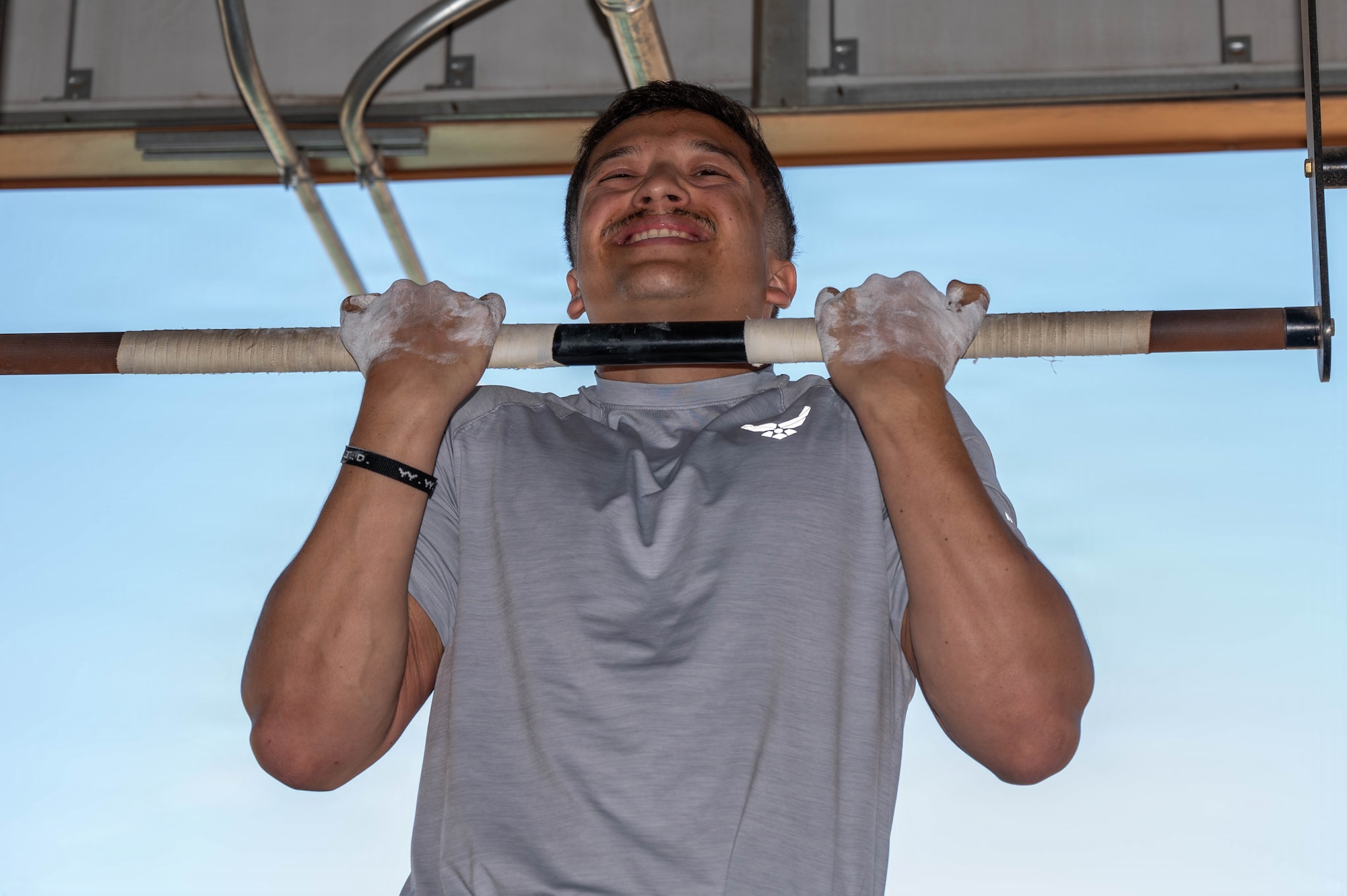 U.S. Air Force Cadet Nicholas Delgado, an ROTC student at Arizona State University, completes the flexed-arm hang portion of the German Armed Forces Proficiency Badge assessment at Goldwater Air National Guard Base, Phoenix, April 2, 2026. The GAFPB is a decoration of the Bundeswehr, the Armed Forces of the Federal Republic of Germany, and is one of few foreign military badges authorized to be worn by U.S. Air Force, Army, and Space Force members.
 (U.S. Air National Guard photo by Airman 1st Class Jacob Hreshchyshyn)