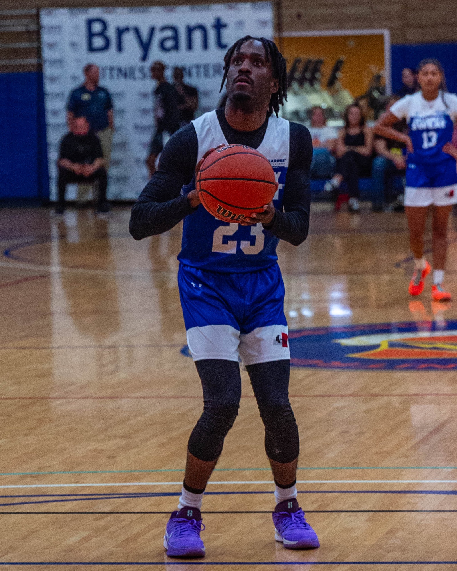D’aydrian Harding, content creator, shoots a free throw, April 2, 2026, at Luke Air Force Base, Arizona.