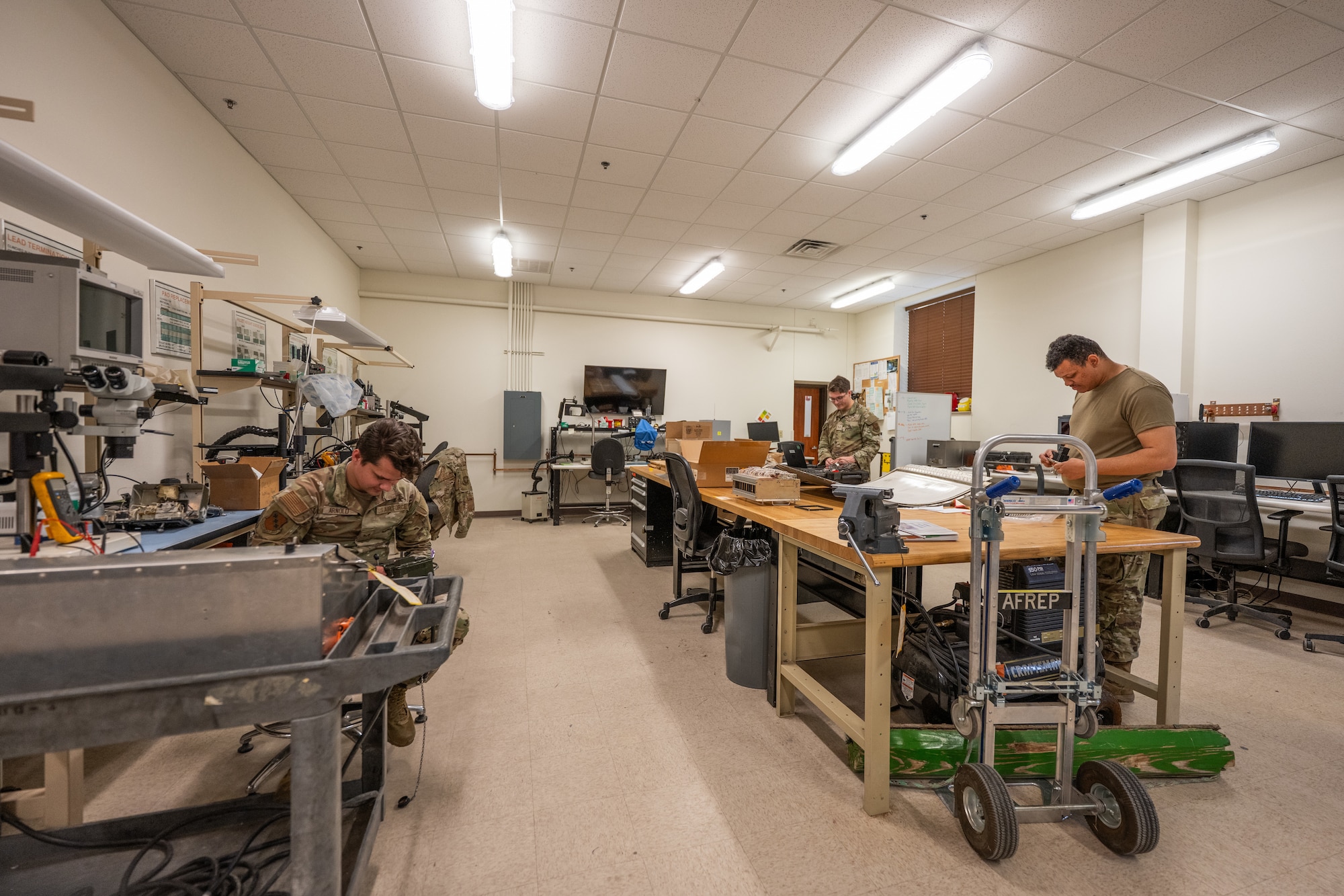 U.S. Airmen assigned to the 7th Maintenance Group Air Force Repair Enhancement Program inspect and test various components at Dyess Air Force Base, Texas, March 27, 2026. AFREP repairs support every aircraft on the installation, reducing reliance on external supply chains and improving mission readiness. (U.S. Air Force photo by Airman 1st Class Caleb Schellenberg)