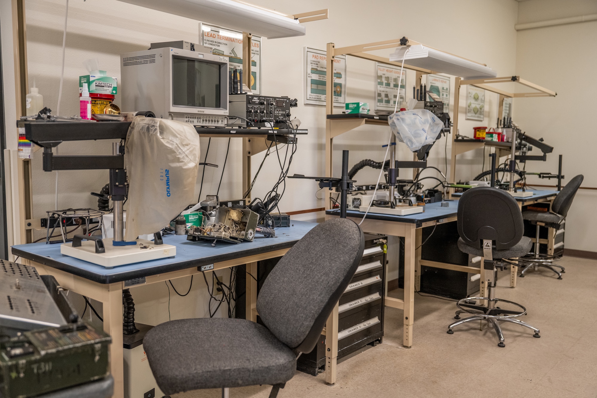 A row of soldering stations is photographed at Dyess Air Force Base, Texas, March 23, 2026. Air Force Repair Enhancement Program technicians use these stations to repair and restore aircraft components, improving readiness and extending equipment lifespan. (U.S. Air Force photo by Airman 1st Class Caleb Schellenberg)