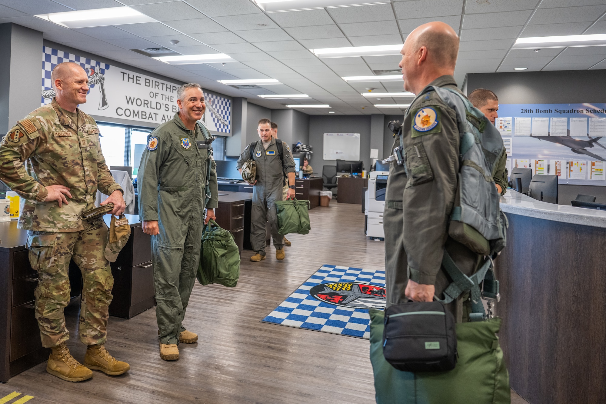 U.S. Air Force Gen. S.L. Davis, commander of Air Force Global Strike Command, and U.S. Air Force Chief Master Sgt. Shawn M. Aiello, AFGSC command chief, prepare to depart from the 28th Bomb Squadron for a local training sortie at Dyess Air Force Base, Texas, March 31, 2026. The primary mission of the 28 BS is to provide all B-1 initial qualification, re-qualification and instructor upgrade training. (U.S. Air Force Photo by Airman 1st Class Caleb Schellenberg)