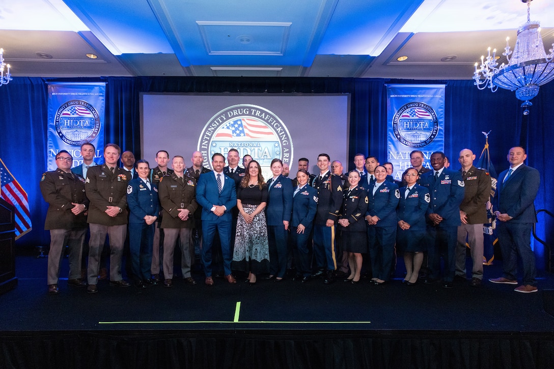 National Guard members stand alongside law enforcement and community partners during the High Intensity Drug Trafficking Area, or HIDTA, National Awards Ceremony hosted by the White House Office of National Drug Control Policy, April 2, 2026.