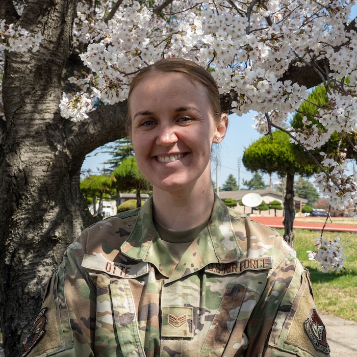 Airman poses for photo.
