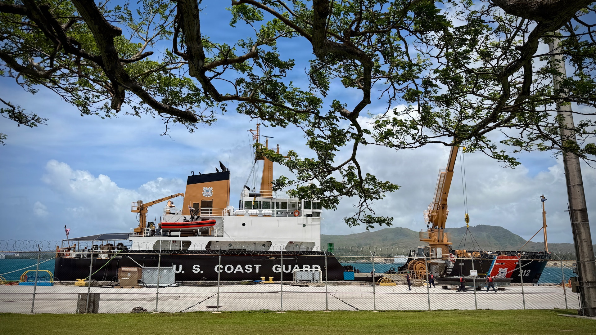 Members of USCGC Hickory (WLB 212) prepare the cutter to sail on April 10, 2026, ahead of storm Sinlaku. U.S. Coast Guard cutters homeported in Apra Harbor are scheduled to depart the island ahead of tropical storm force winds. This is standard practice and is not a withdrawal of support. Repositioning preserves the cutter crews’ ability to return quickly and respond to post-storm emergencies, including search and rescue, once it is safe to operate. (U.S. Coast Guard photo by Chief Warrant Officer Sara Muir)