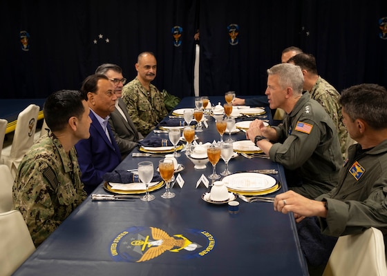 U.S. Ambassador to Singapore Dr. Anjani Sinha (left center left) and Deputy Chief of Mission Graham Mayer (left center right) meet with U.S. 7th Fleet Commander Vice Adm. Pat Hannifin aboard 7th Fleet flagship USS Blue Ridge (LCC 19) during a scheduled port visit to Singapore, April 7, 2026.