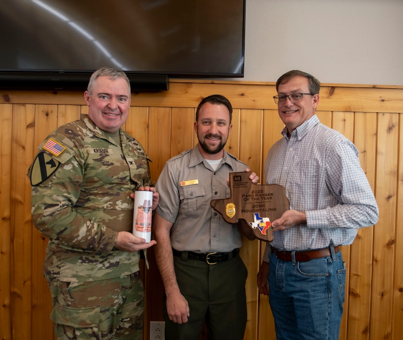 Fort Worth District, U.S. Army Corps of Engineers Commander Col. Calvin Kroeger and Operations Division Chief Tim Macallister present Josh Houghtaling with a plaque for being honored as the 2025 Ranger of the Year.