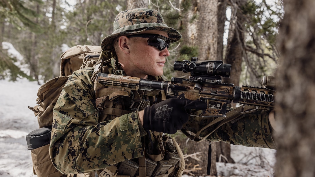 U.S. Marine Corps Cpl. Nathan Jackson, an intelligence chief with Alpha Company, 1st Battalion, 2nd Marine Regiment, 2nd Marine Division, patrols during a combat patrol as part of Mountain Warfare Training Exercise 2-26 on Marine Corps Mountain Warfare Training Center, Bridgeport, California, March 13, 2026. MTX is a one-month-long exercise designed to prepare units to survive and strengthen expeditionary warfare tactics in cold-weather mountainous environments. (U.S. Marine Corps photo by Lance Cpl. Dominic Trujillo)