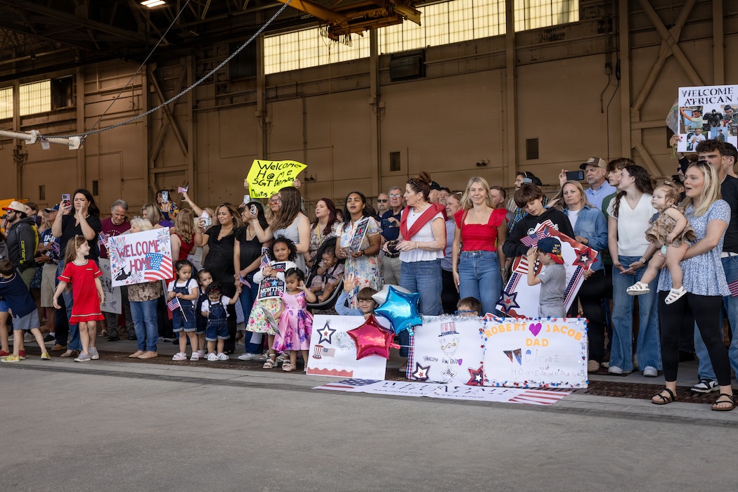 Friends and family wait for Marines and Sailors assigned to Marine Medium Tiltrotor Squadron (VMM) 162, Marine Aircraft Group 26, 2nd Marine Aircraft Wing, during a homecoming reception at Marine Corps Air Station New River, April 4, 2026. VMM-162 returned home after a six-month deployment in support of Combined Joint Task Force-Horn of Africa. (U.S. Marine Corps photo by Staff Sgt. Maximiliano Rosas)
