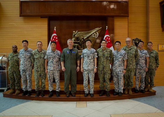 U.S. 7th Fleet Commander Vice Adm. Pat Hannifin (center left) and senior leaders from U.S. 7th Fleet meet with Republic of Singapore Navy (RSN) Fleet Commander Rear Adm. Kwan Hon Chuong (center right) and senior RSN leaders at the RSN Fleet Command Building in RSS Singapura – Changi Naval Base, Singapore, during a scheduled port visit, April 7, 2026.