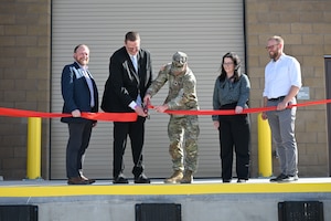 From left: Dr. Andrew Williams, acting director of the Space Warfare Directorate; Mr. Michael Holthe, principal deputy assistant secretary of war for science and technology; Lt. Col. Matthew Miller, commander, U.S. Army Corps of Engineers Albuquerque District; Amy Hall, Nuclear Enterprise Science and Technology Complex lead, Nuclear Mission Branch; and Charles Rowell Jr., deputy chief, RVBN, participate in a ribbon-cutting ceremony at Kirtland Air Force Base, New Mexico, March 24, 2026. The ceremony marked the opening of the Re-Entry Vehicle Integration Laboratory (REVIL), a purpose-built facility designed to address a longstanding gap in reentry vehicle integration and experimentation. REVIL enables the safe assembly, disassembly and integration of experimental systems, providing critical infrastructure to support next-generation research, reduce risk in technology development and transition and strengthen the Air Force Research Laboratory’s role in advancing credible, modernized deterrence capabilities in support of the nuclear enterprise. (U.S. Air Force photo by Senior Airman Donnell Schroeter)