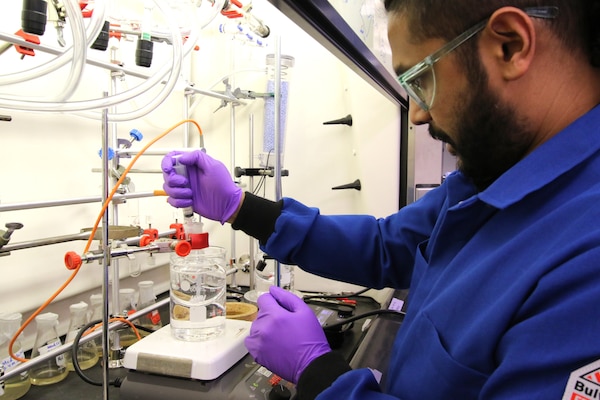 A researcher performing experiments.