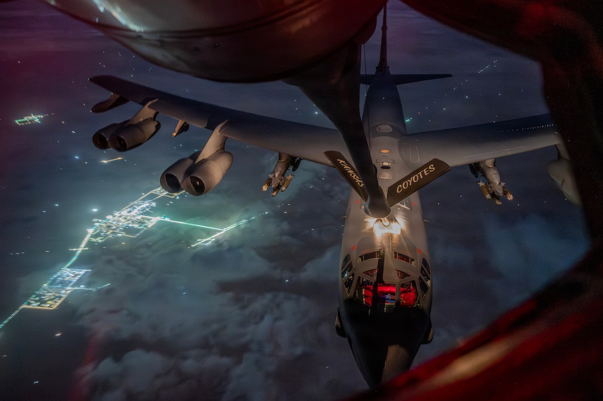 A U.S. Air Force B-52 Stratofortress receives refuel support from a KC-135 Stratotanker during Operation Epic Fury over the U.S. Central Command area of responsibility, March 26, 2026. Aerial refueling extends global strike reach and ensures sustained bomber operations across the theater. (U.S. Air Force photo)