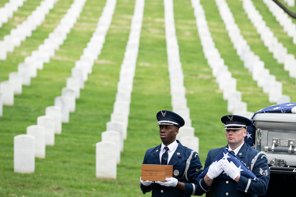 Honor Guard Airmen conduct full military funeral honors with escort for Col. Clarence "Bud" Anderson at Arlington National Cemetery, Va., March 30, 2026. Anderson was the last living American triple flying ace of World War II, a pilot who has downed at least 15 enemy aircraft, and had a career in service for 30 years. (U.S. Army photo by Elizabeth Fraser)