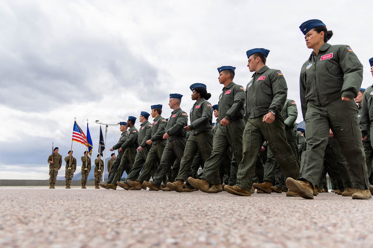 Academy cadets march in formation during the annual Founders' Day Parade on The Terrazzo at the U.S. Air Force Academy in Colorado Spring, Colo., April 1, 2026. Founders’ Day is a traditional celebration of the legacy and future of the USAFA and its founders. (U.S. Air Force photo by Trevor Cokley)