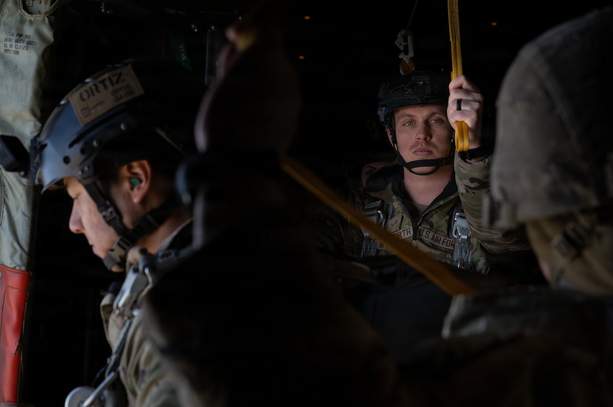 U.S. Air Force Senior Airman Anthony Woodworth, 435th Security Forces Squadron contingency response team member, prepares to jump out of a C-130J Super Hercules during an airborne operation as part of a European Airborne Airlift Conference near Ramstein Air Base, Germany, April 2, 2026. Woodworth was among several 435th SFS Airmen who took part in the operation, demonstrating the unit's ability to integrate with multinational forces in a live airborne environment. (U.S. Air Force photo by Senior Airman Trevor Calvert)