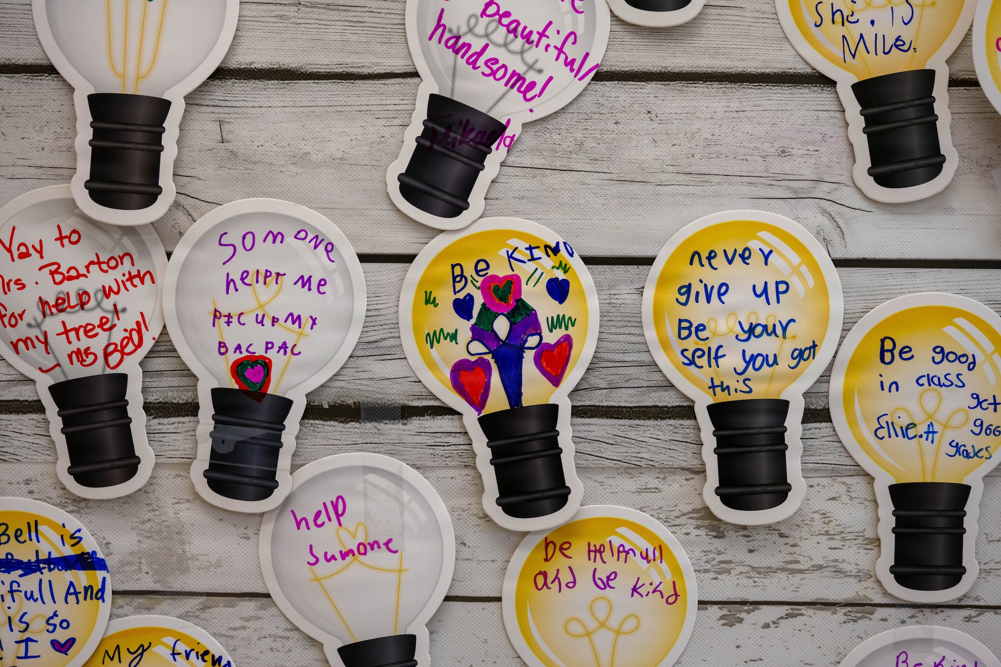 Inspirational quotes on lightbulb sticky notes