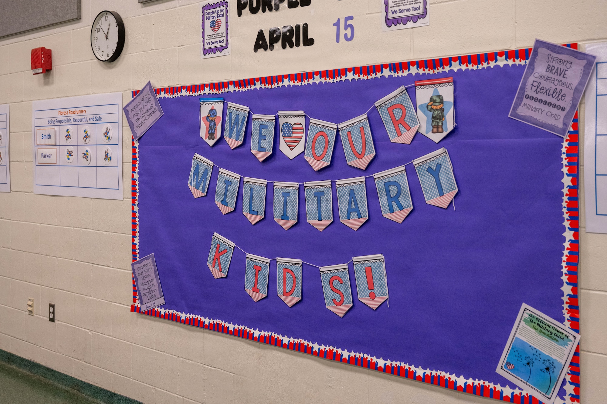 We love military kids on a banner in a school