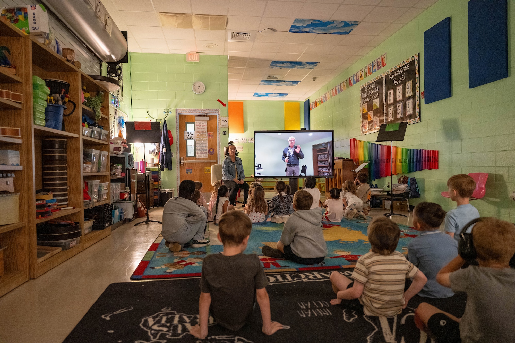 Kids sit in music class