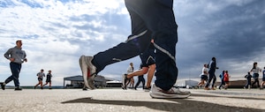 Members of the 55th Wing participate in a 5.5 km run as part of a Comprehensive Airmen Fitness day event on Offutt Air Force Base, April 10, 2026. CAF days are U.S. Air Force training events designed to enhance mental, spiritual, physical, and social resilience for personnel. (U.S. Air Force photo by Chad Watkins)