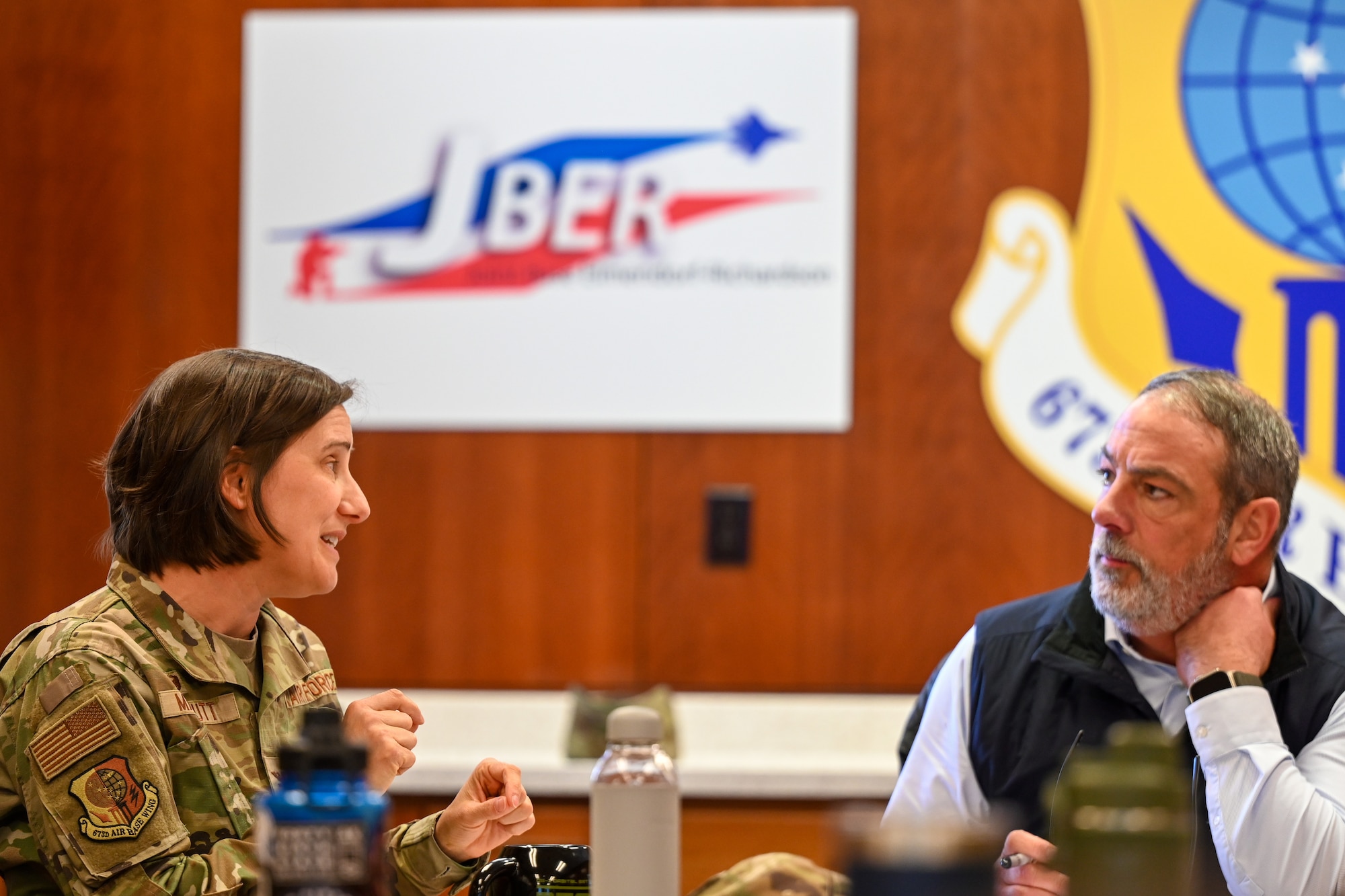 U.S. Air Force Col. Lisa Mabbutt, 673d Air Base Wing and Joint Base Elmendorf-Richardson commander, discusses the unique regional obstacles of Alaska with Terry Umatum, the recently appointed port director of the Don Young Port of Alaska, at JBER, Alaska, April 3, 2026. Throughout the meeting, Umatum and Mabbutt discussed the unique transportation issues Alaska faces and how to best overcome these challenges. (U.S. Air Force photo by Airman 1st Class Eli A. Rose)