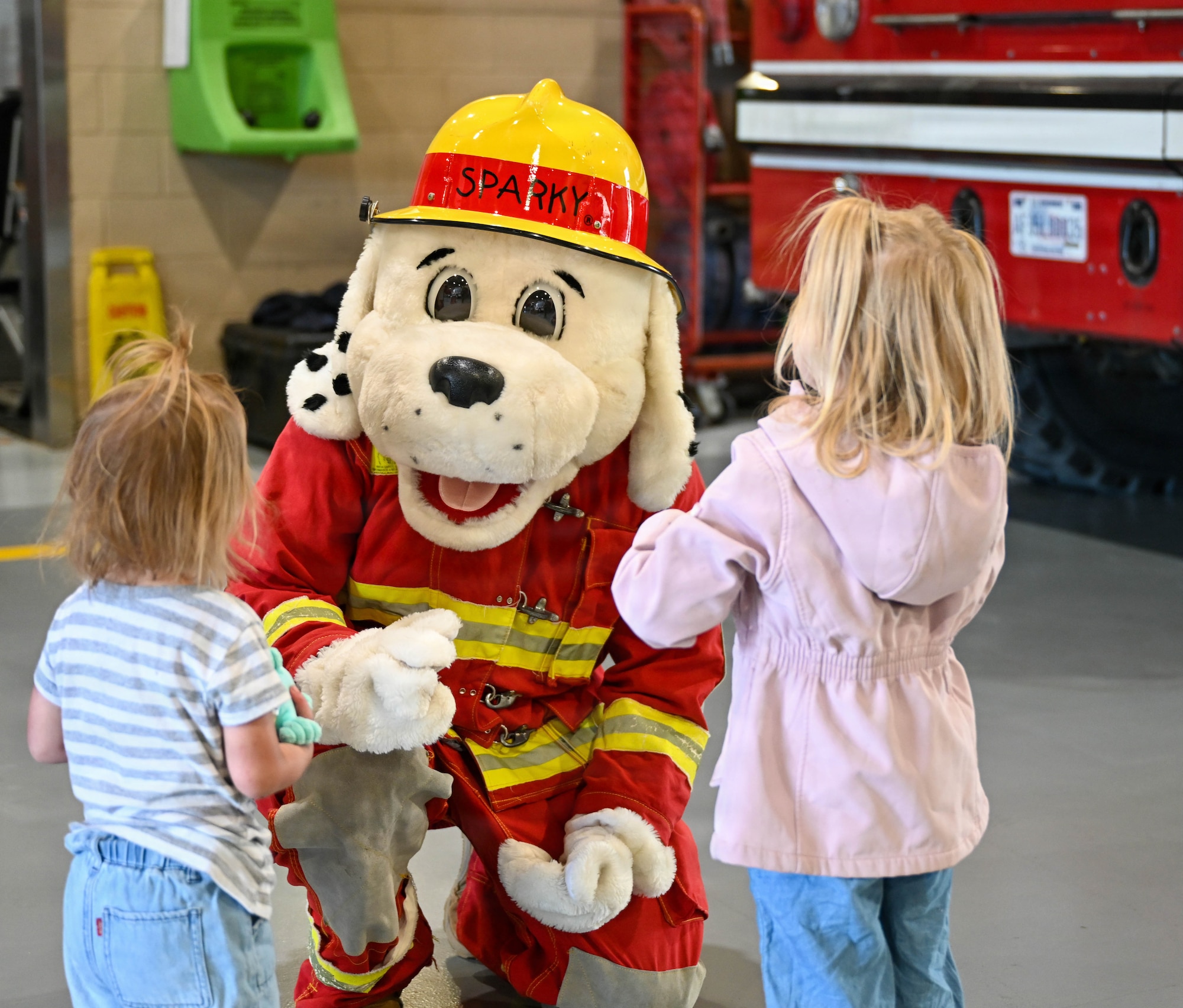 Kids talk to Sparky the Fire Dog
