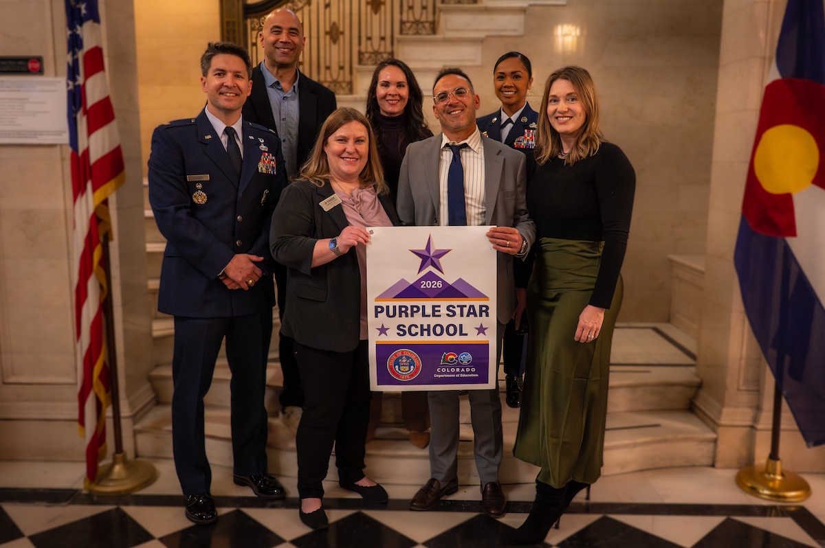 people stand for group photos