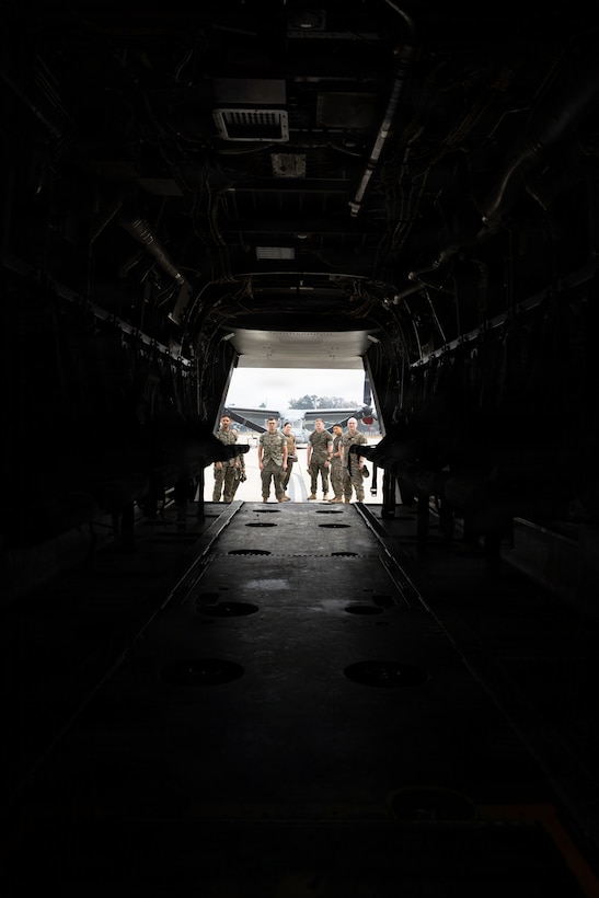 U.S. Marines with 9th Communication Battalion, I Marine Expeditionary Force Information Group, board an MV-22B Osprey assigned to Marine Medium Tiltrotor Squadron (VMM) 164, Marine Aircraft Group 39, 3rd Marine Aircraft Wing, during a deployment readiness air confidence operation at Marine Corps Base Camp Pendleton, California, March 23, 2026. DRACOs enable Marines to enhance combat readiness through aviation movement rehearsals, ensuring forces remain prepared to deploy and operate in support of Marine Air-Ground Task Force operations. (U.S. Marine Corps photo by Sgt. Kristin Louise Long)