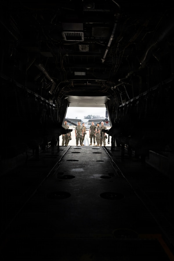 U.S. Marines with 9th Communication Battalion, I Marine Expeditionary Force Information Group, board an MV-22B Osprey assigned to Marine Medium Tiltrotor Squadron (VMM) 164, Marine Aircraft Group 39, 3rd Marine Aircraft Wing, during a deployment readiness air confidence operation at Marine Corps Base Camp Pendleton, California, March 23, 2026. DRACOs enable Marines to enhance combat readiness through aviation movement rehearsals, ensuring forces remain prepared to deploy and operate in support of Marine Air-Ground Task Force operations. (U.S. Marine Corps photo by Sgt. Kristin Louise Long)