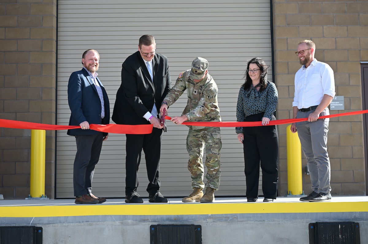 From left: Dr. Andrew Williams, acting director of the Space Warfare Directorate; Mr. Michael Holthe, principal deputy assistant secretary of war for science and technology; Lt. Col. Matthew Miller, commander, U.S. Army Corps of Engineers Albuquerque District; Amy Hall, Nuclear Enterprise Science and Technology Complex lead, Nuclear Mission Branch; and Charles Rowell Jr., deputy chief, RVBN, participate in a ribbon-cutting ceremony at Kirtland Air Force Base, New Mexico, March 24, 2026. The ceremony marked the opening of the Re-Entry Vehicle Integration Laboratory (REVIL), a purpose-built facility designed to address a longstanding gap in reentry vehicle integration and experimentation. REVIL enables the safe assembly, disassembly and integration of experimental systems, providing critical infrastructure to support next-generation research, reduce risk in technology development and transition and strengthen the Air Force Research Laboratory’s role in advancing credible, modernized deterrence capabilities in support of the nuclear enterprise. (U.S. Air Force photo by Senior Airman Donnell Schroeter)