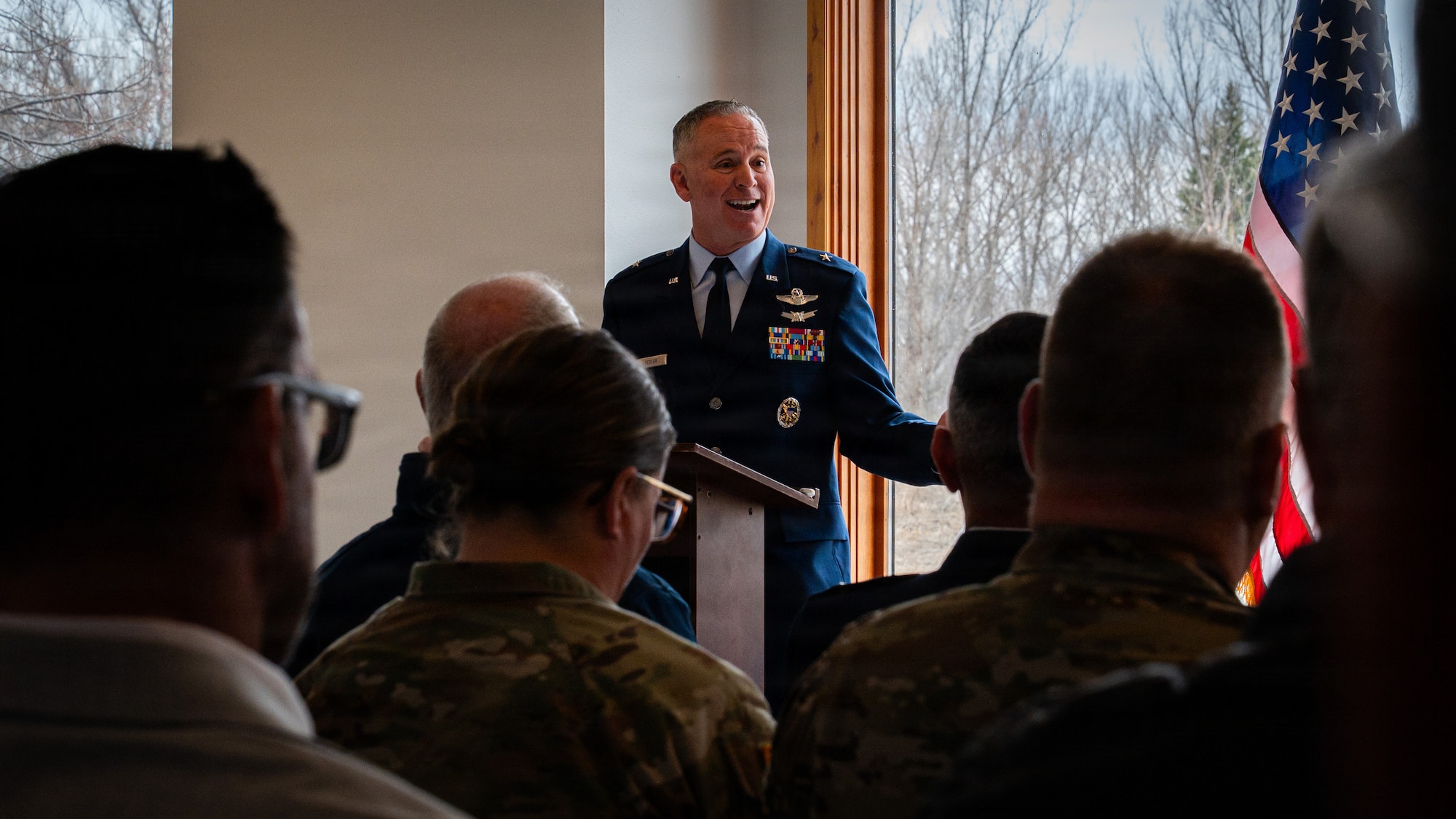 Brig. Gen. Micah Fesler, Air National Guard advisor to the commander, Air Combat Command, speaks during a Point Defense Battle Lab ribbon cutting ceremony at Grand Forks Air Force Base, North Dakota, April 9, 2026.