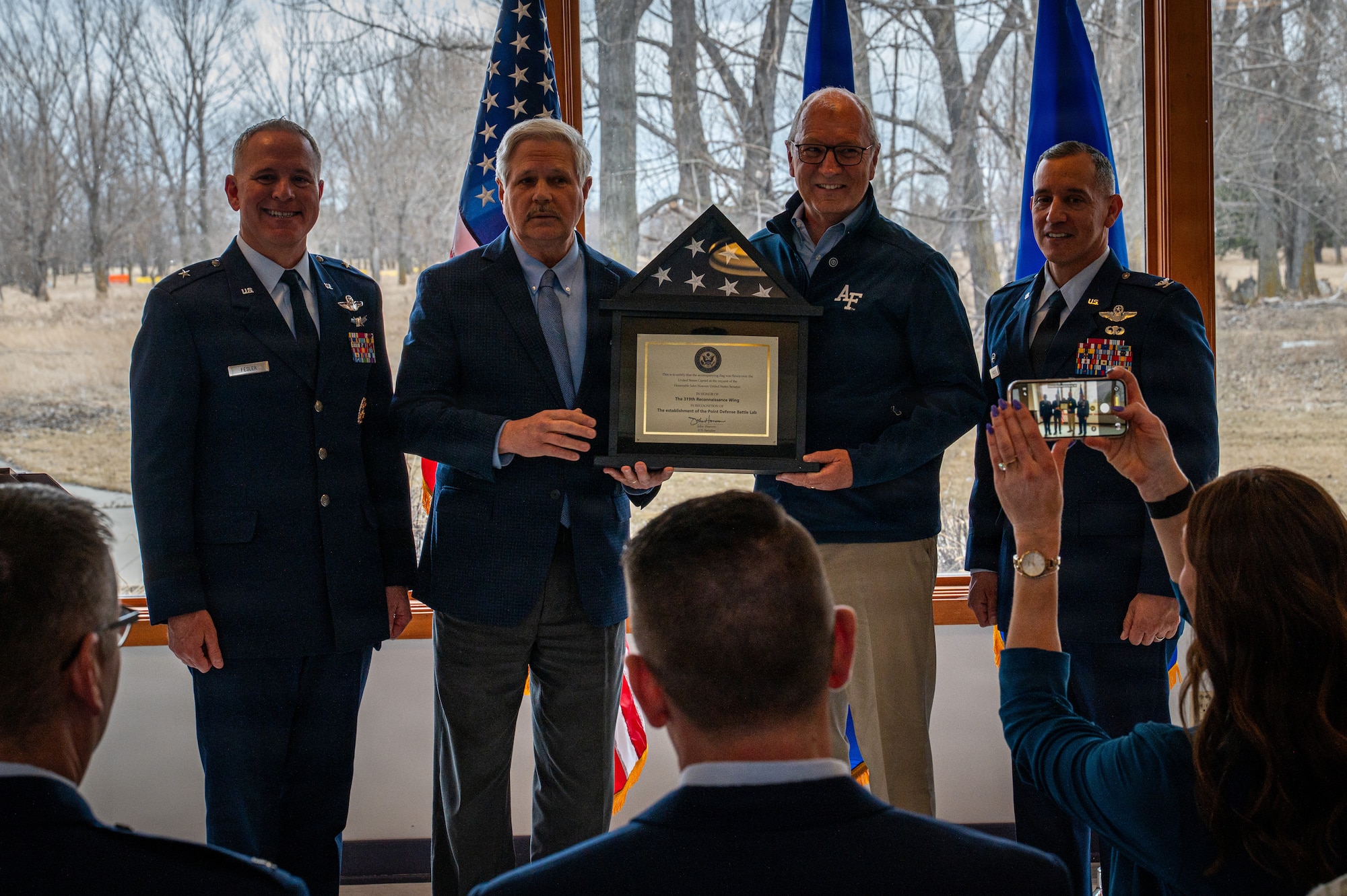 From left, Brig. Gen. Micah Fesler, Air National Guard advisor to the commander, Air Combat Command; Sen. John Hoeven, R-N.D.; Sen. Kevin Cramer, R-N.D. and Col. Alfred Rosales, 319th Reconnaissance Wing commander; pose for a photo during a Point Defense Battle Lab ribbon cutting ceremony at Grand Forks Air Force Base, North Dakota, April 9, 2026.