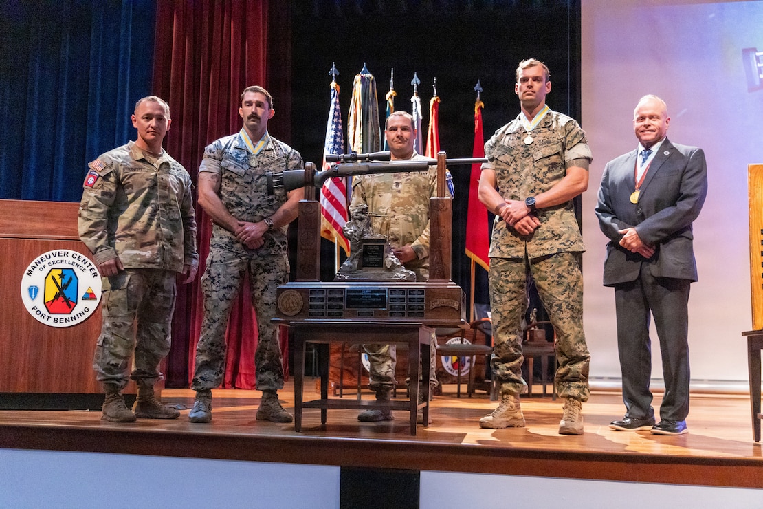 The 2026 International Sniper Competition ends with an Awards Ceremony April 10, 2026 in McGinnis-Wickam Hall on Fort Benning, Georgia. Staff. Sgt. Tyler Johnson and Sgt. Spencer Harrell, representing the United States Marine Corps, won the championship trophy. (U.S. Army photo by Daniel Marble)