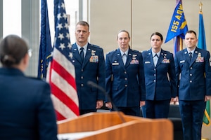 Col. Brooke Sciuto, outgoing 155th Medical Group commander, salutes Col. Christopher Hesse, 155th Air Refueling Wing commander, at her change of command ceremony, April 11, 2026, at the Nebraska National Guard air base in Lincoln, Nebraska. Sciuto thanked Hesse for his leadership and friendship over the past four years. (U.S. Air National Guard photo by Tech. Sgt. Phil Cowen)