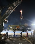 Sailors assigned to Whidbey Island-class dock landing ship USS Ashland (LSD 48) uses the ship’s 60-ton crane to lift a crane from the Philippine Navy 3rd Naval Combat Engineer Battalion onto Ashland as part of multilateral Maritime Cooperative Activity (MCA) with the Armed Forces of the Philippines and Royal Australian Navy in Manila, Philippines, April 9, 2026.