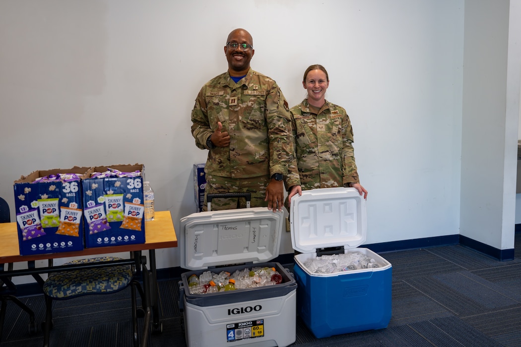 People pose for a photo.